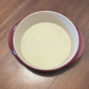 Used Pampered Chef Round Stoneware Baker in Cranberry color